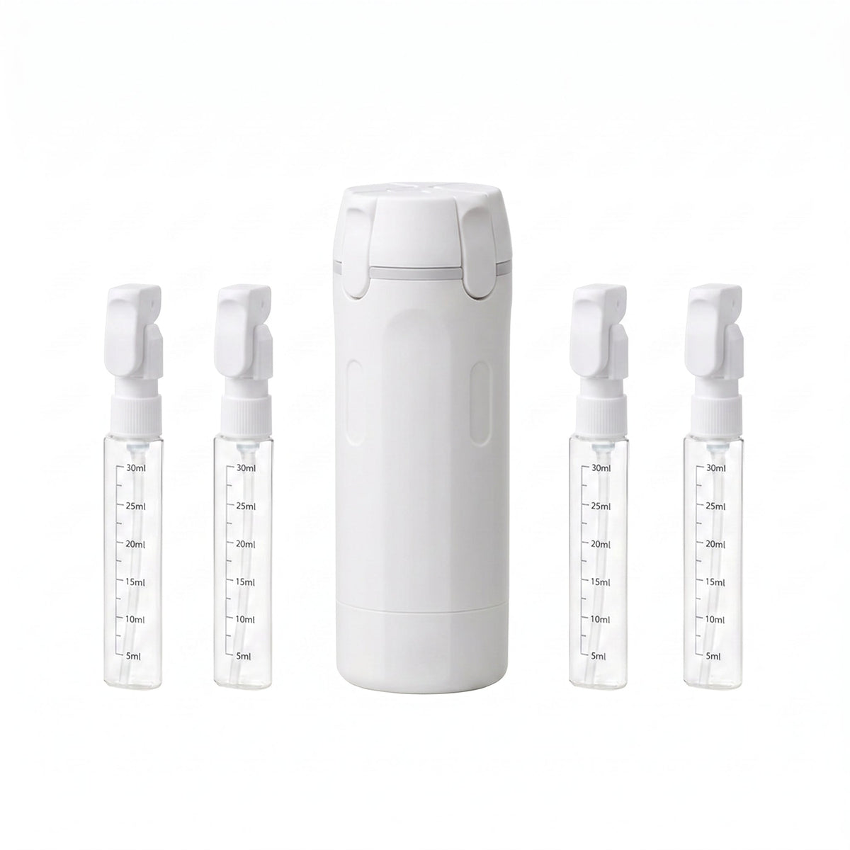White Naduko dispenser with its 4 refillable 30 ml bottles