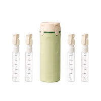 Dispensador Naduko verde matcha con las 4 botellitas rellenables de 30 ml