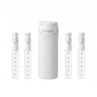 Dispensador Naduko blanco con las 4 botellitas rellenables de 30 ml