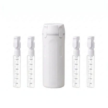 White Naduko dispenser with its 4 refillable 30 ml bottles